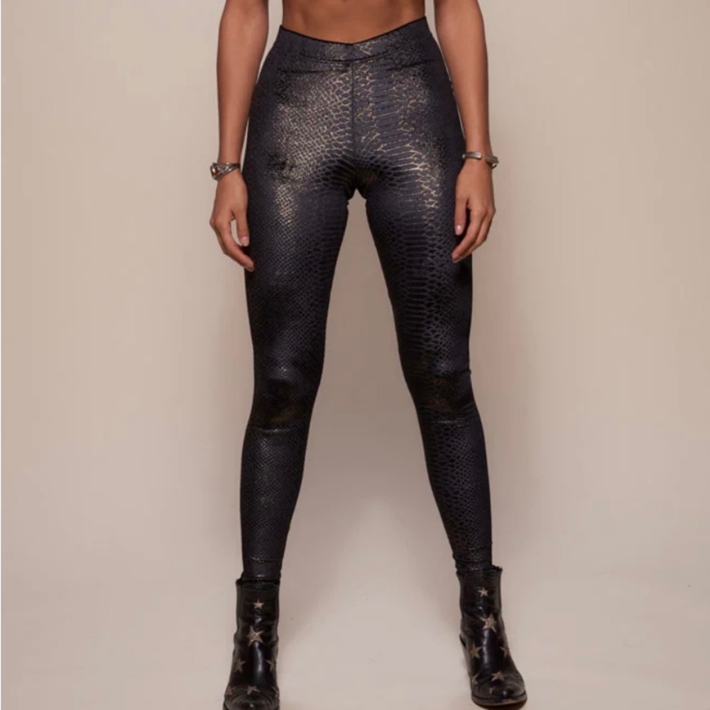 Black snake skin, velvet leggings by Spirit hood.